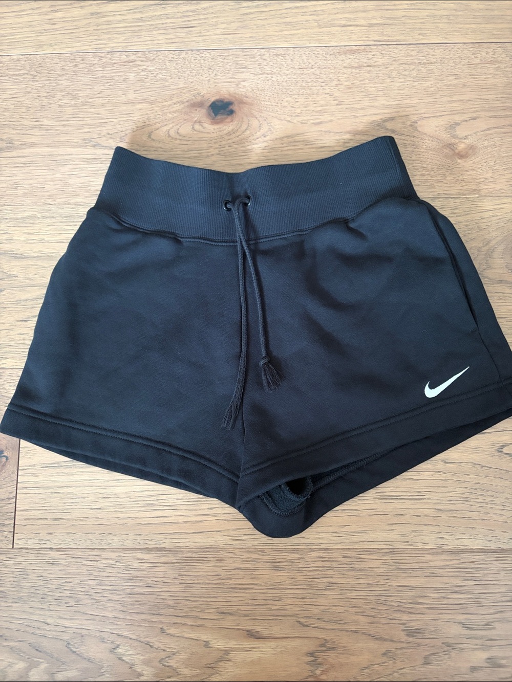 Nike Black Women's Drawstring Athletic Shorts with White Swoosh